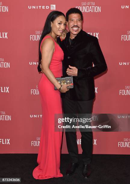 Singer Lionel Richie and Lisa Parigi arrive at SAG-AFTRA Foundation Patron of the Artists Awards 2017 on November 9, 2017 in Beverly Hills,...