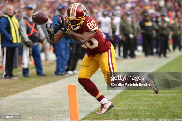 Wide receiver Jamison Crowder of the Washington Redskins attempts to make a catch during the fourth quarter against the Minnesota Vikings at...