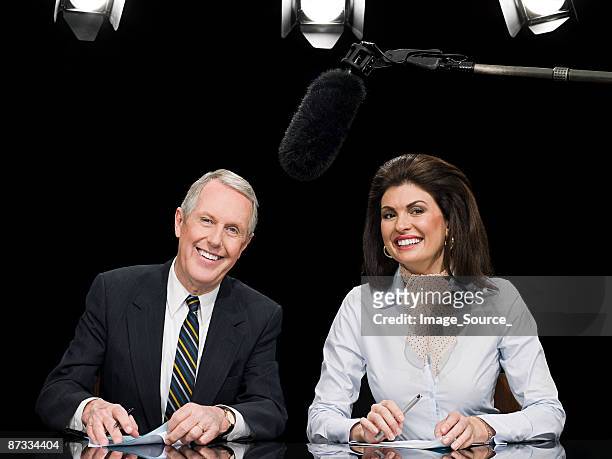 news presenters - newscaster stock pictures, royalty-free photos & images