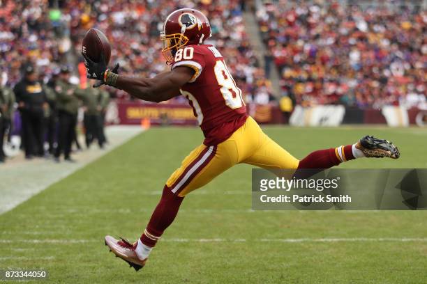 Wide receiver Jamison Crowder of the Washington Redskins attempts to make a catch during the fourth quarter against the Minnesota Vikings at...