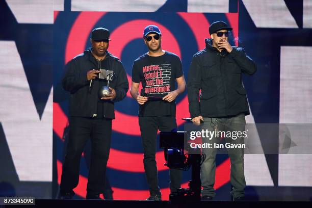 Rap-Rock supergroup Chuck D, Tom Morello and B-Real of Prophets of Rage present the award for Best Hip Hop on stage during the MTV EMAs 2017 held at...