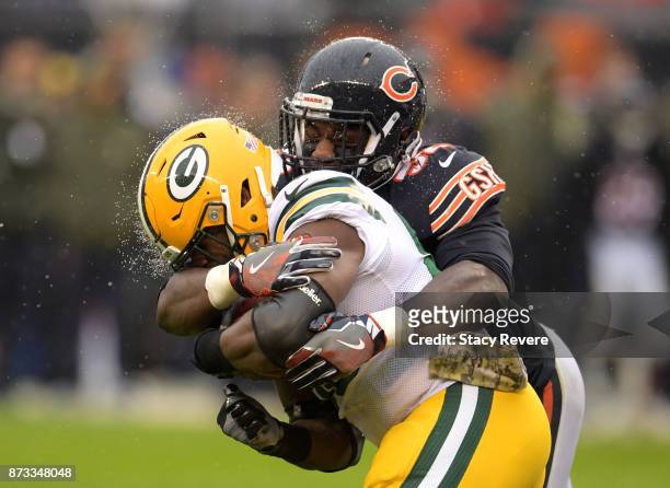 Christian Jones of the Chicago Bears hits Ty Montgomery of the Green Bay Packers in the second quarter at Soldier Field on November 12, 2017 in...