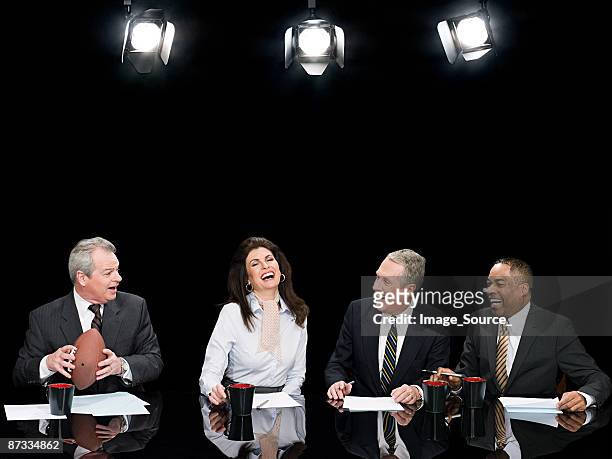 news presenters laughing - newscaster stock pictures, royalty-free photos & images