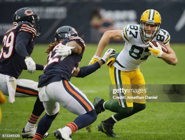 Jordy Nelson of the Green Bay Packers moves after a catch against Eddie Jackson and Cre'von LeBlanc of the Chicago Bears at Soldier Field on November...