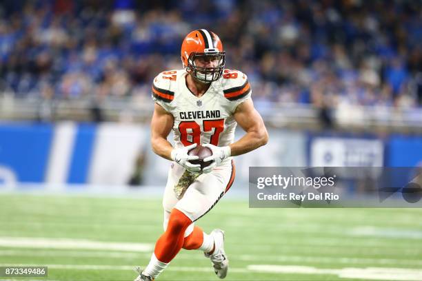 Seth DeValve of the Cleveland Browns makes a catch and runs for the first down late in the fourth quarter during the game against the Detroit Lions...