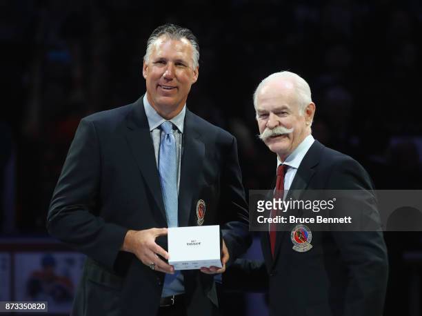 Dave Andrychuk is honored for his induction into the Hall of Fame prior to the Legends Classic game at the Air Canada Centre on November 12, 2017 in...