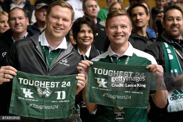 Fans of the Utah Valley Wolverines pose for a photo while holding towels prior to the game against the Duke Blue Devils at Cameron Indoor Stadium on...