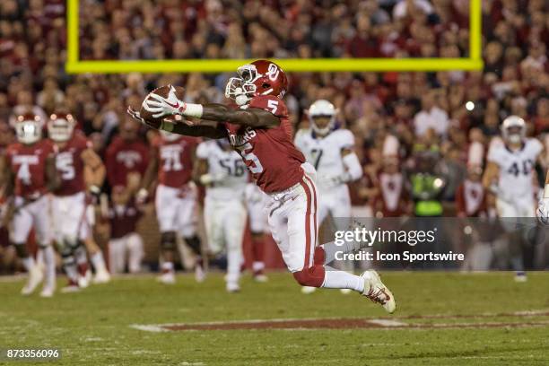 Wide receiver Marquise Brown of the Oklahoma Sooners catches the pass during the Oklahoma Sooners and the Texas Christian University Horned Frogs...