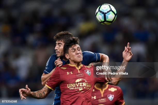 Lucas Silva of Cruzeiro and Pedro of Fluminense battle for the ball during a match between Cruzeiro and Fluminense as part of Brasileirao Series A...