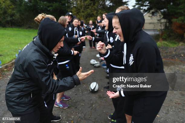 Fiona Coghlan and Christelle Le Duff join in with the team to play rock paper scissors ahead of the Inaugural Representative Match between Barbarians...