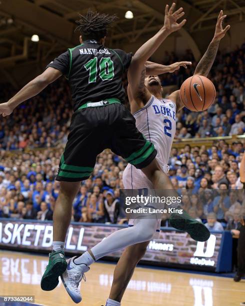 Ben Nakwaasah of the Utah Valley Wolverines collides with Gary Trent, Jr. #2 of the Duke Blue Devils at Cameron Indoor Stadium on November 11, 2017...