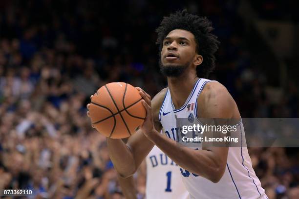 Marvin Bagley III of the Duke Blue Devils concentrates at the free-throw line against the Utah Valley Wolverines at Cameron Indoor Stadium on...