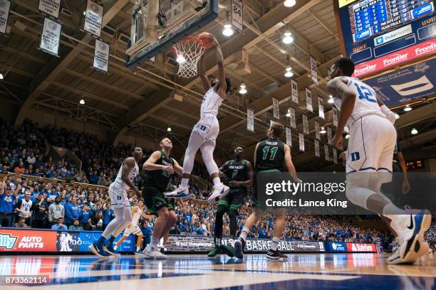 Marvin Bagley III of the Duke Blue Devils dunks the ball against the Utah Valley Wolverines at Cameron Indoor Stadium on November 11, 2017 in Durham,...