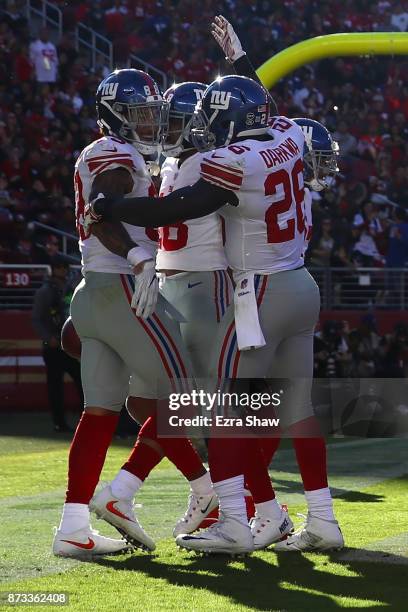 Evan Engram of the New York Giants celebrates with Paul Perkins after a touchdown against the San Francisco 49ers during their NFL game at Levi's...