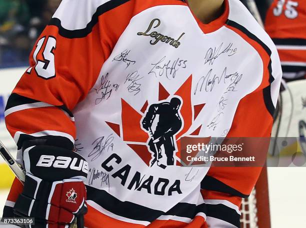 Danielle Goyette shows off the signatures of participants in the Legends Classic game at the Air Canada Centre on November 12, 2017 in Toronto,...