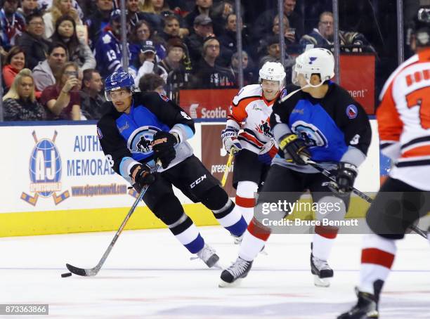 Teemu Selanne and Paul Kariya skate in the Legends Classic game at the Air Canada Centre on November 12, 2017 in Toronto, Canada. Both players are...