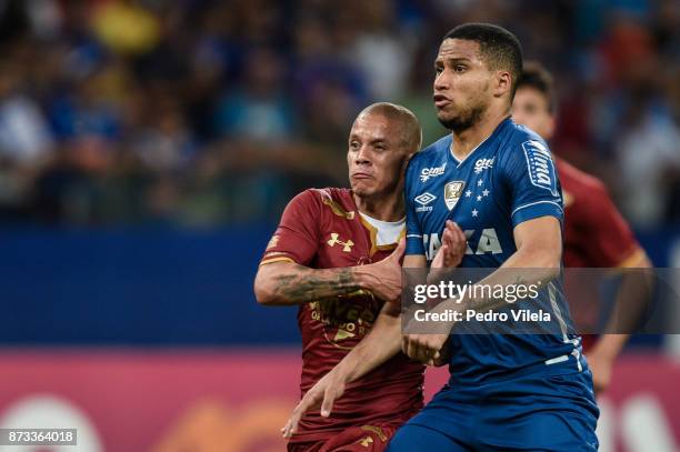 Murilo Cerqueira of Cruzeiro and Marcos Junior of Fluminense battle for the ball during a match between Cruzeiro and Fluminense as part of...