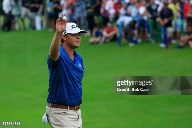 Patton Kizzire of the United States celebrates on the 18th green after winning during the final round of the OHL Classic at Mayakoba on November 12,...