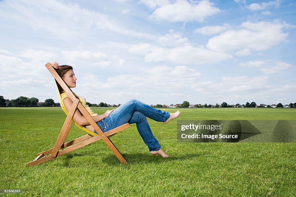 Young woman in deckchair