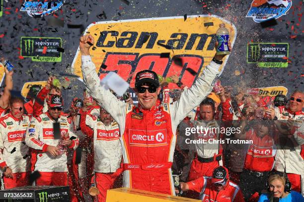 Matt Kenseth, driver of the Circle K Toyota, celebrates in victory lane after winning the Monster Energy NASCAR Cup Series Can-Am 500 at Phoenix...