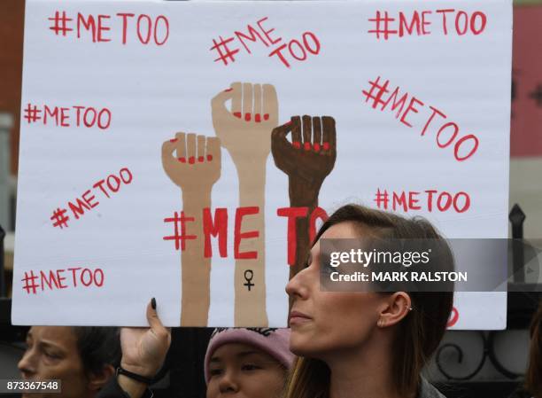 Victims of sexual harassment, sexual assault, sexual abuse and their supporters protest during a #MeToo march in Hollywood, California on November...