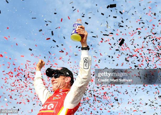Matt Kenseth, driver of the Circle K Toyota, celebrates in victory lane after winning the Monster Energy NASCAR Cup Series Can-Am 500 at Phoenix...