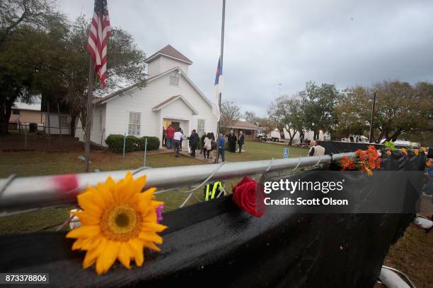 Visitors tour the First Baptist Church of Sutherland Springs after it was turned into a memorial to honor those who died on November 12, 2017 in...