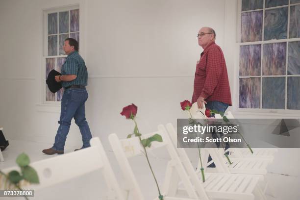 Visitors tour the First Baptist Church of Sutherland Springs after it was turned into a memorial to honor those who died on November 12, 2017 in...