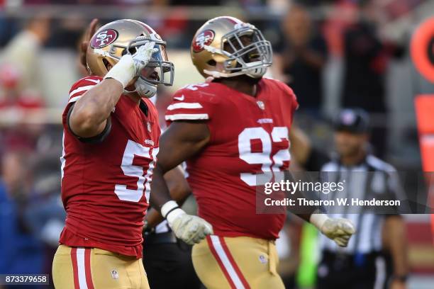 Brock Coyle of the San Francisco 49ers salutes after a play against the New York Giants during their NFL game at Levi's Stadium on November 12, 2017...