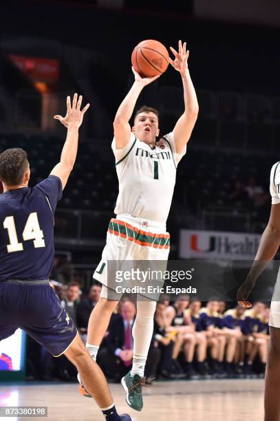 Dejan Vasiljevic of the Miami Hurricanes shoots the ball during the second half against the Miami Hurricanes at The Watsco Center on November 12,...