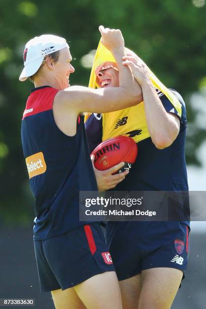 In this series Christian Petracca is tackled by Josh Wagner during a Melbourne Demons AFL training session at Gosch's Paddock on November 13, 2017 in...