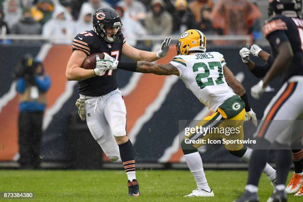 Chicago Bears tight end Adam Shaheen battles with Green Bay Packers safety Josh Jones during an NFL football game between the Green Bay Packers and...