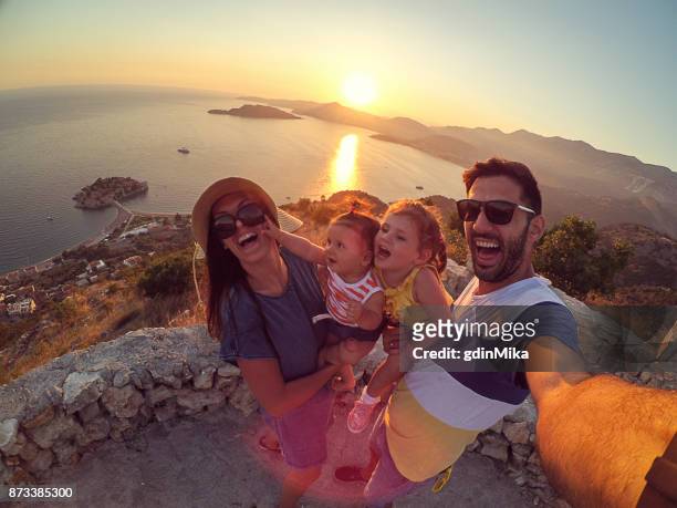 family with two little daughters travel in nature, making selfie, smiling - men selfie wide stock pictures, royalty-free photos & images