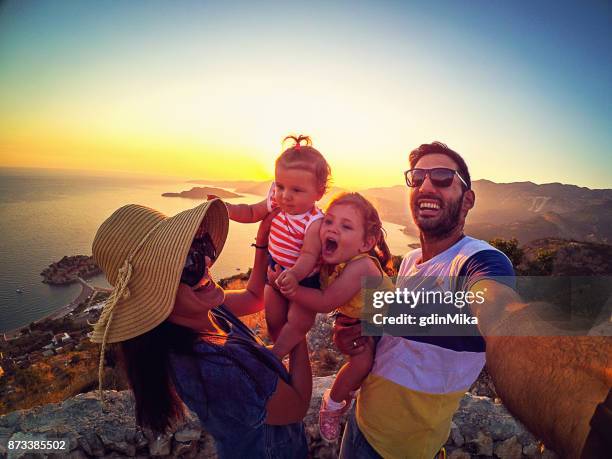 family with two little daughters travel in nature, making selfie, smiling - men selfie wide stock pictures, royalty-free photos & images