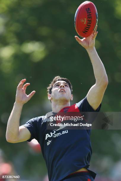 Christian Petracca of the Demons marks the ball during a Melbourne Demons AFL training session at Gosch's Paddock on November 13, 2017 in Melbourne,...
