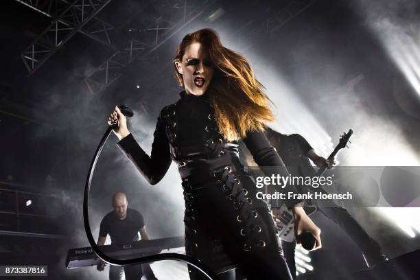 Singer Simone Simons of the Dutch band Epica performs live on stage during a concert at the Kesselhaus on November 12, 2017 in Berlin, Germany.