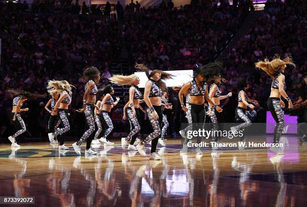 The Sacramento Kings Dancers preform while there's a break in the action against the Philadelphia 76ers during an NBA basketball game at Golden 1...