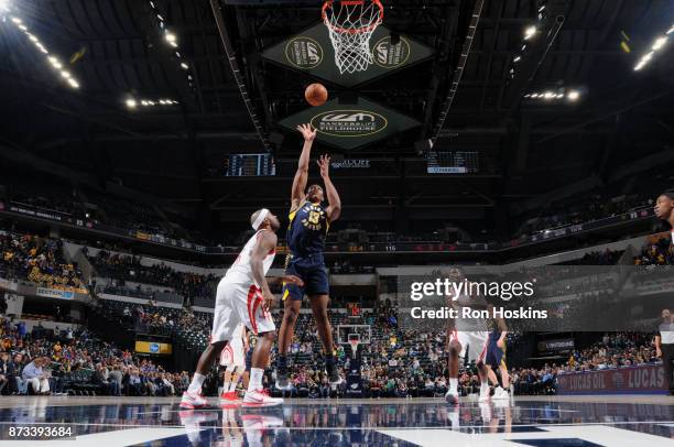 Ike Anigbogu of the Indiana Pacers shoots the ball against the Houston Rockets on November 12, 2017 at Bankers Life Fieldhouse in Indianapolis,...