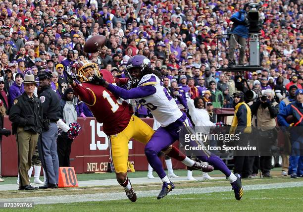 Washington Redskins wide receiver Maurice Harris hauls in a touchdown over Minnesota Vikings cornerback Trae Waynes during a match between the...