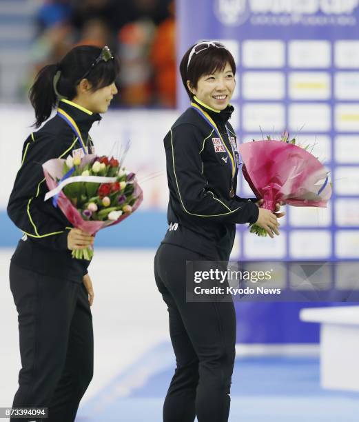 Japan's Nao Kodaira smiles during a medal ceremony after winning the women's 1,000 meters on the final day of the season's first World Cup speed...