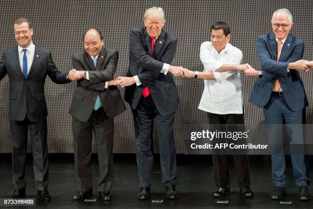 Russian Prime Minister Dmitry Medvedev , Vietnam's Prime Minister Nguyen Xuan Phuc , US President Donald Trump , Philippine President Rodrigo Duterte...