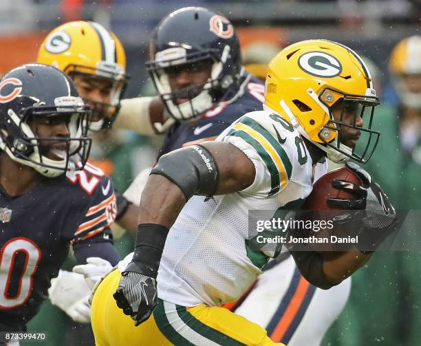 Ty Montgomery of the Green Bay Packers runs for a touchdown against the Chicago Bears at Soldier Field on November 12, 2017 in Chicago, Illinois. The...