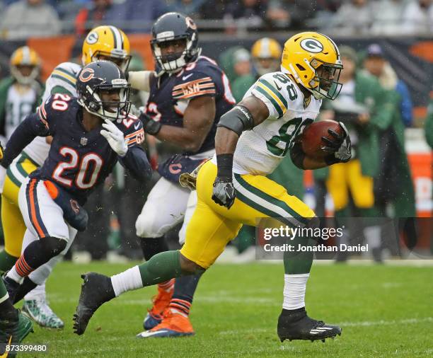 Ty Montgomery of the Green Bay Packers runs for a touchdown against the Chicago Bears at Soldier Field on November 12, 2017 in Chicago, Illinois. The...