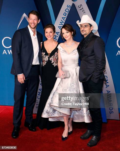 Clayton Kershaw, Kimberly Williams-Paisley, and Brad Paisley attend the 51st annual CMA Awards at the Bridgestone Arena on November 8, 2017 in...