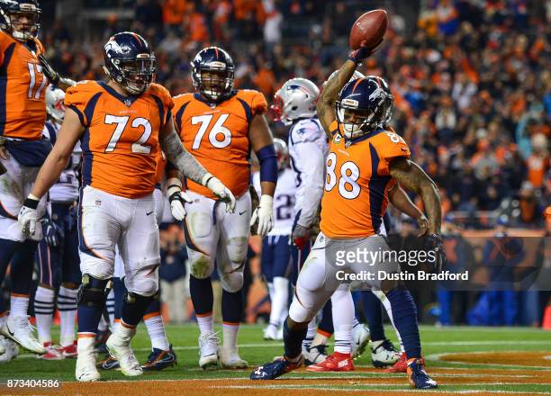 Wide receiver Demaryius Thomas of the Denver Broncos celebrates after scoring a third quarter touchdown against the New England Patriots at Sports...