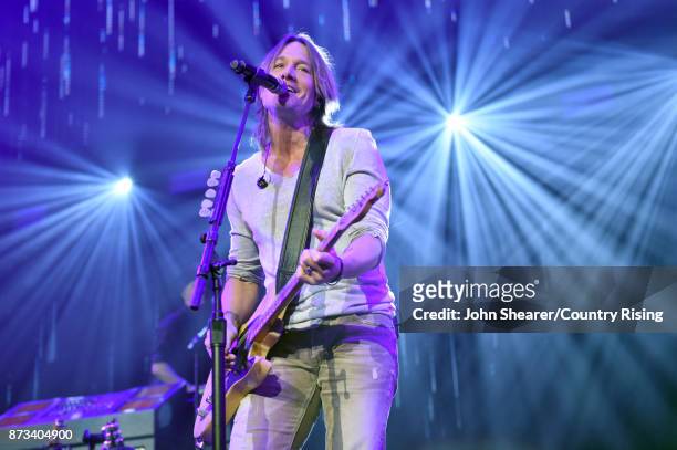 In this handout photo provided by The Country Rising Fund of The Community Foundation of Middle Tennessee, musical artist Keith Urban performs...