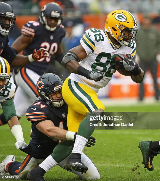 Ty Montgomery of the Green Bay Packers is tackled by Nick Kwiatkoski of the Chicago Bears at Soldier Field on November 12, 2017 in Chicago, Illinois.