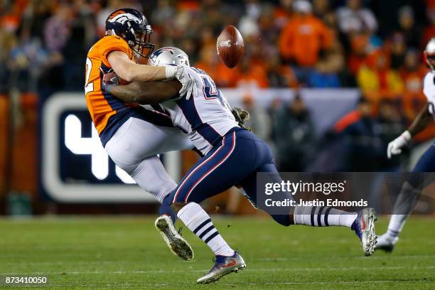 Linebacker David Harris of the New England Patriots breaks up a pass intended for tight end Jeff Heuerman of the Denver Broncos at Sports Authority...