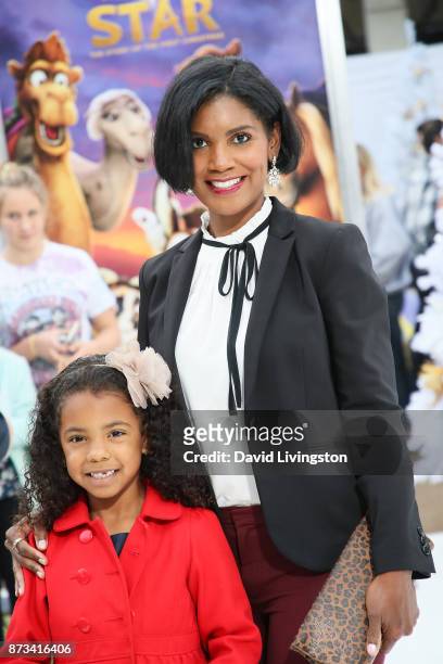 Denise Boutte and guest arrive at the Premiere of Columbia Pictures' "The Star" at the Regency Village Theatre on November 12, 2017 in Westwood,...