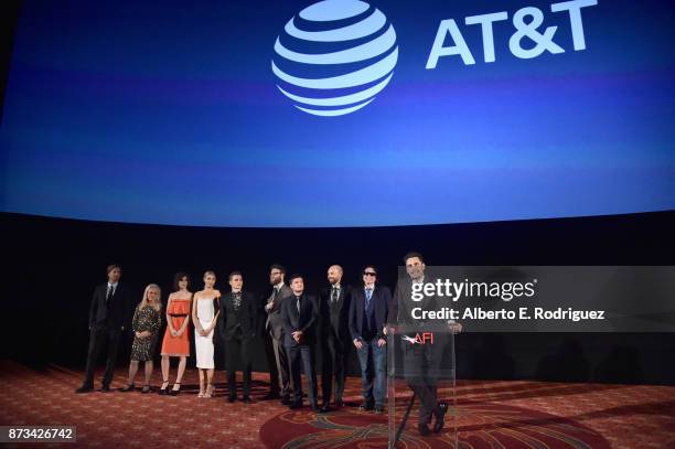 Greg Sestero, Jacki Weaver, Alison Brie, Ari Graynor, Dave Franco, Seth Rogen, Josh Hutcherson, Paul Scheer, and Tommy Wiseau listen to James Franco...